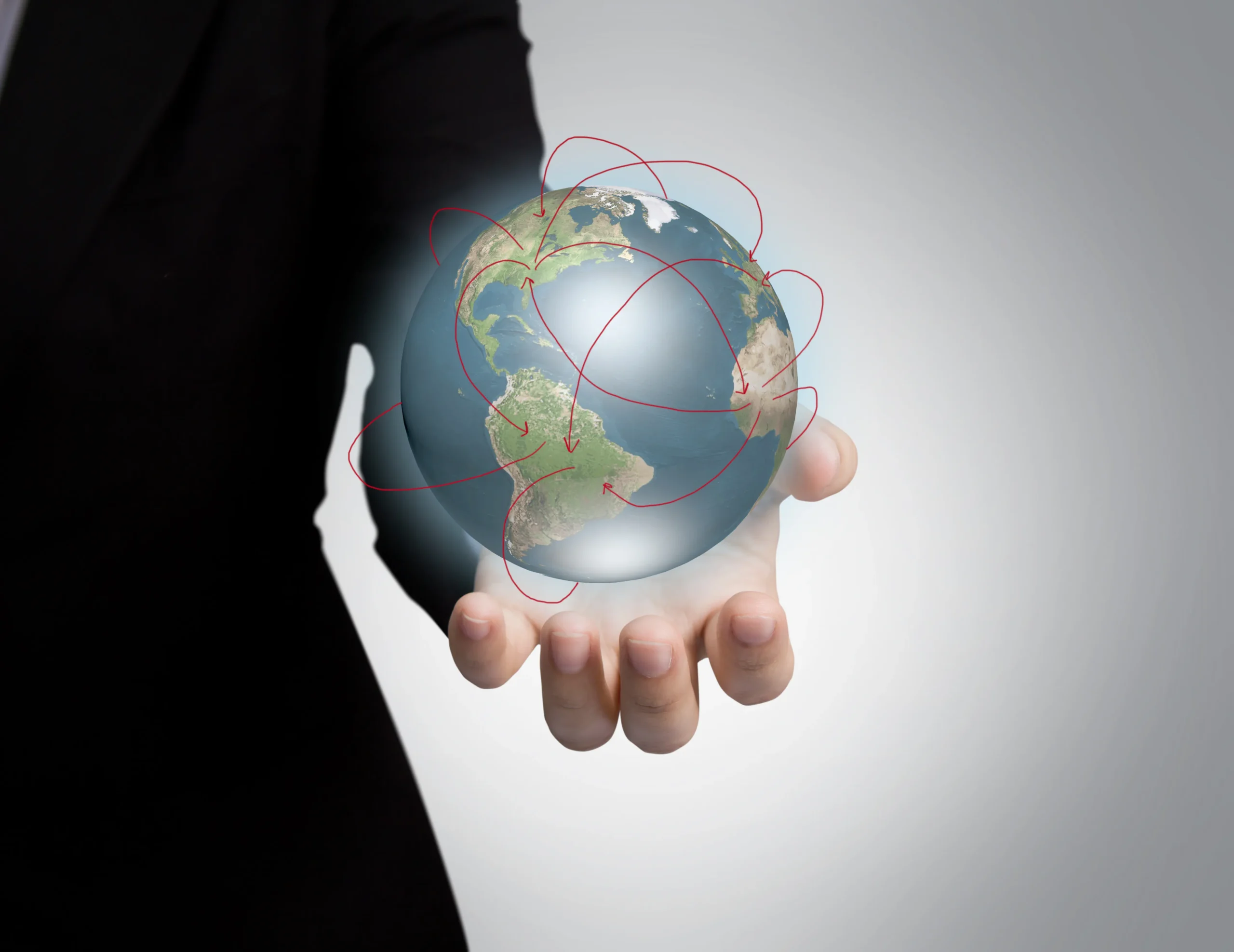 mano-sujetando-un-planeta-tierra-brillante